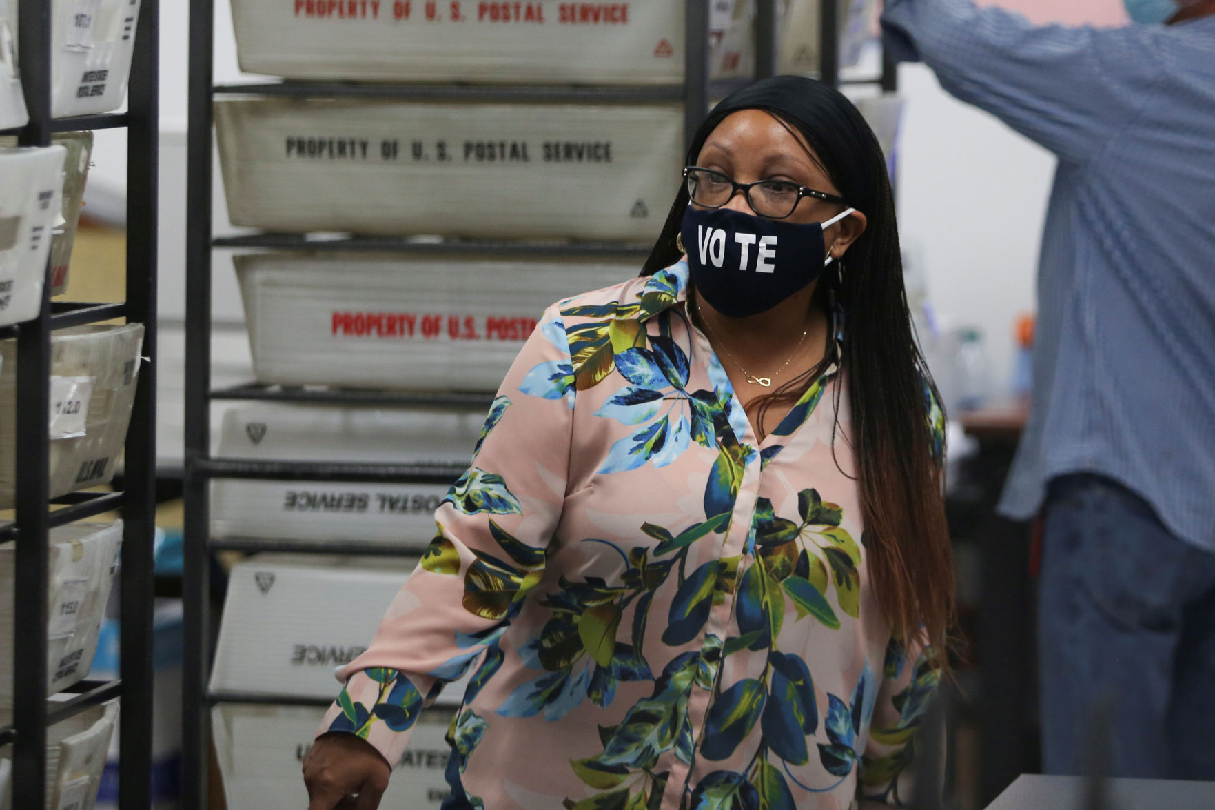 FILE PHOTO: Voters cast their ballots in Florida's primaries